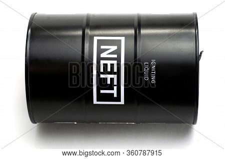 Black Iron Barrel With The Inscription Igniting Liquid Neft Lies On The White Background