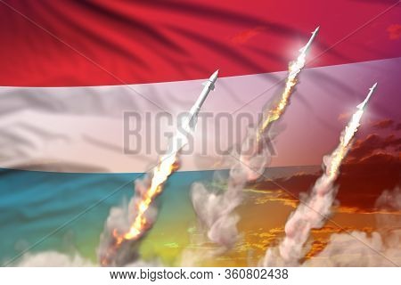Luxembourg Ballistic Warhead Launch - Modern Strategic Nuclear Rocket Weapons Concept On Sunset Back
