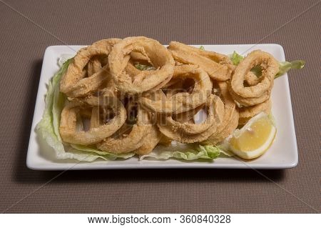 View Of A Typical Spanish Tapa Called Calamares A La Plancha