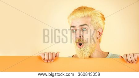 Close Up Portrait Of Excited Man Showing Plain Blank Sign