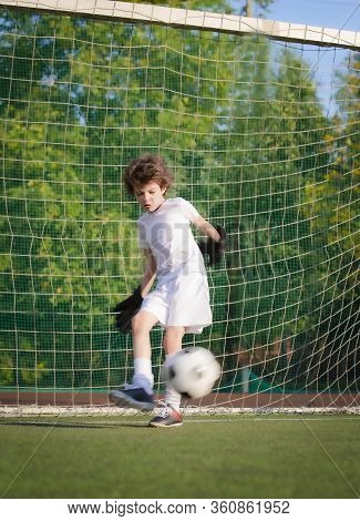 Summer Soccer Tournament For Young Kids. Football Club. Emotions And Joy Of The Game. Young Goalie. 