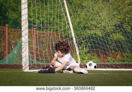 Summer Soccer Tournament For Young Kids. Football Club. Emotions And Joy Of The Game. Young Goalie. 