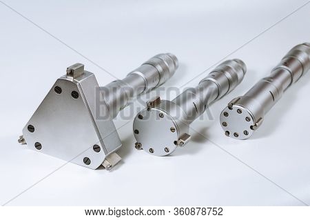 Set Of Calibration Micrometers. Device For Accurately Measuring The Diameter Of The Hole, On A White