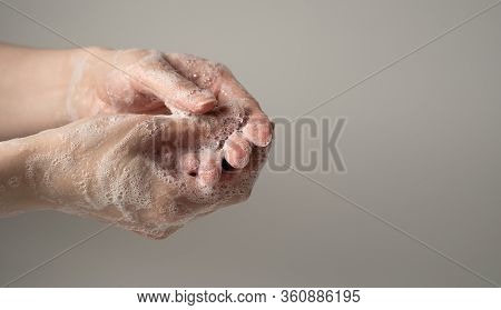 Wash Your Hands With Soap To Protect Them From Viruses And Bacteria. The Concept Of Protecting And P