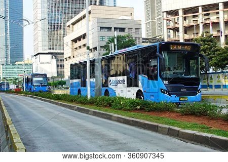Jakarta, Indonesia  - June 6, 2019 ; Bus Rapid Transit (brt) Passes On Mh Thamrin Street In Central 