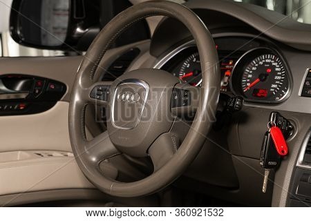 Novosibirsk/ Russia - April 02, 2020: Audi Q7, Auto Interior: Steering Wheel With Red Logo Audi   An
