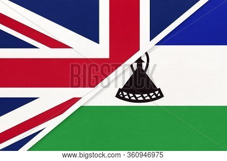 United Kingdom Of Great Britain And Ireland Or Uk Vs Kingdom Of Lesotho National Flag From Textile. 