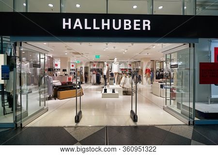 MUNICH, GERMANY - CIRCA JANUARY, 2020: entrance to Hallhuber store in Munich Airport.