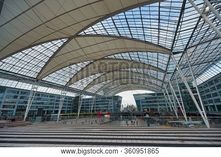 MUNICH, GERMANY - CIRCA JANUARY, 2020: view of the Munich Airport Center in the daytime. The Munich Airport Center is a shopping, business, and recreation area that connects the terminals