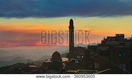 Mardin, Turkey - January 2020: Mardin Landscape At Sunset With Minaret Of Ulu Cami, Also Known As Gr