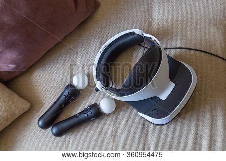 Moscow,russia - April 12 2020 A Playstation 4 Vr Headset Together With A Playstation 4 Controller An