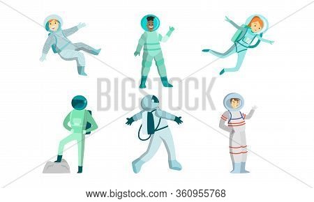 Set Of Young Men And Women Austronauts In Special Metallic Costume In Outer Space