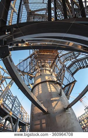 The View From The Bottom On The Maintenance Platforms At The Top Of The Column For Hydrocracking In 