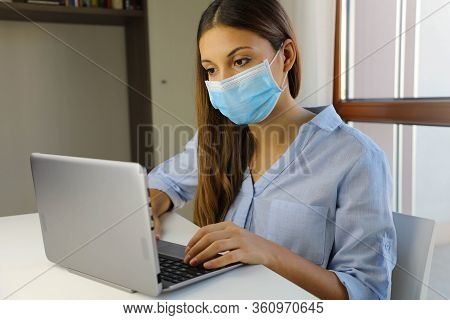 Covid-19 Pandemic Coronavirus Home Schooling E-learning Student Girl Mask Study From Home Laptop. Qu