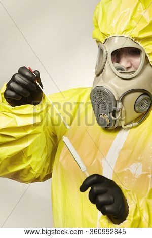 Specialist In Virus Protective Suit Getting Mucous Membrane Smear For Testing