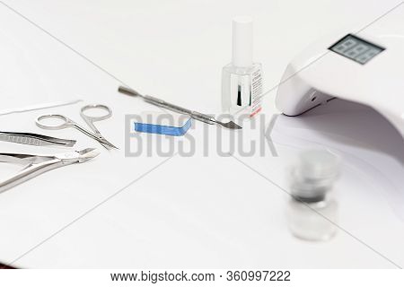 Manicure Kit Gel Nail Polish On White Background