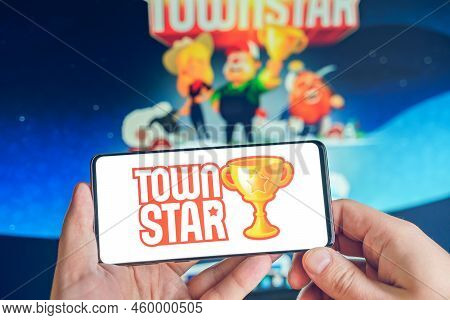 Russia Moscow 25.12.2021 Logo Of Townstar. Blockchain Nft Ethereum Cryptocurrency Strategy Game. Man