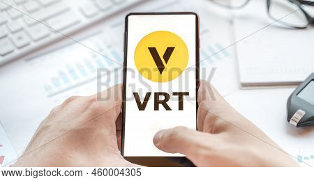 Logo Of Venus Coin In Tablet. Cryptocurrency Vrt Token. Trading Blockchain Platform To Buy,sell On D