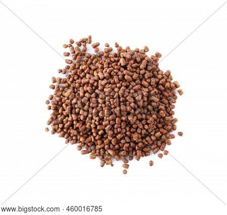 Pile Of Buckwheat Tea Granules On White Background, Top View