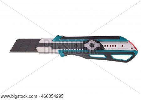 Green And Black Office Cutter Knife With A Snap-off Blade And A Locking Device Isolated Over White B