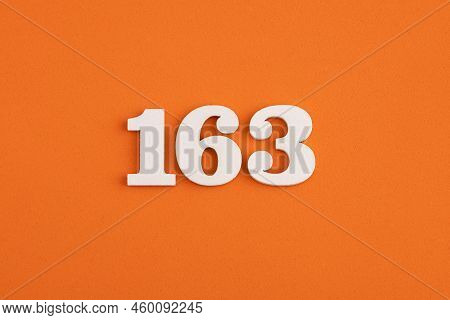Number 163 - On Orange Foam Rubber Background