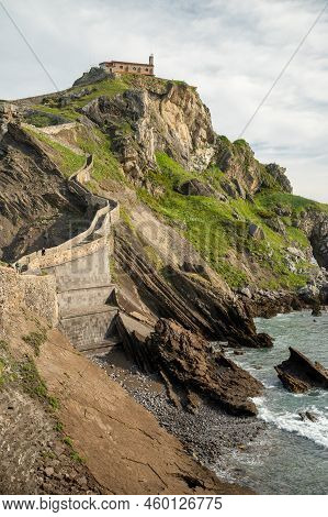 Stone Footpath To Famous Landmark And Film Location In North Of Spain, Ocean Islet With Chapel San J
