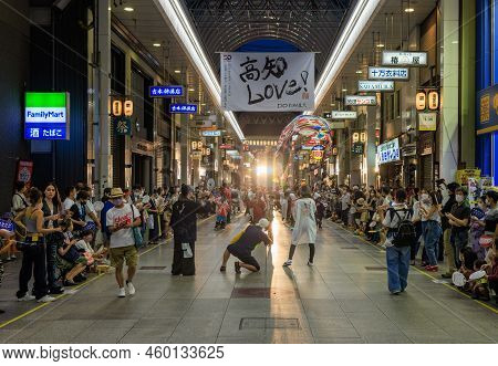 Kochi, Japan - August 10, 2022: Photographers Take Pictures Of Performers In Covered Shopping Street