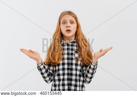 Clueless Teen Girl Shrugs Shoulders, Smiles Nervously, Saying Sorry, Dont Know, Have Nothing, Standi