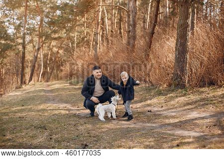Cute Family Playing In A Summer Park
