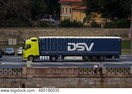 A Truck With A Large Dsv Postal Semi-trailer Drives Down The Street. Riga, Latvia - 22 Aug 2022.