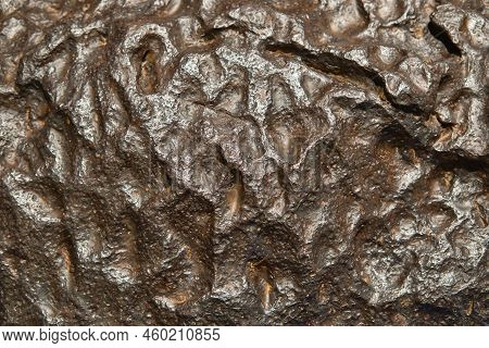 The Metal Meteorite Surface Close-up As Background.