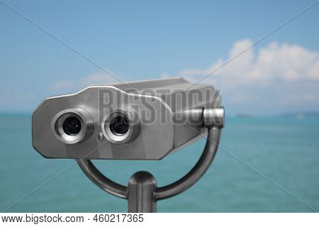 Metal Tower Viewer Installed Near Sea. Mounted Binoculars