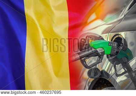 Car With A Fuel Injector On Moldavia Flag Background. Record Prices Fuel For Population. Gasoline Pr