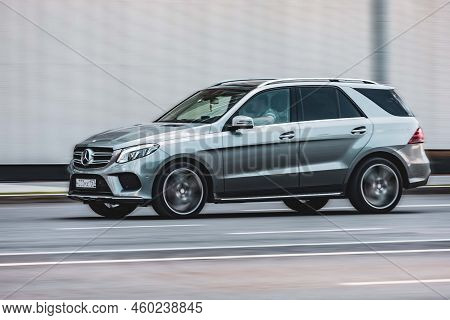 Car Mercedes-benz Ml Rides On The Road. Gray Silver Suv Rushes Along The Street. Moscow, Russia - Au