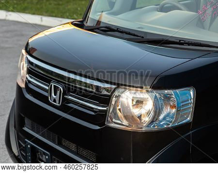 Novosibirsk, Russia -   August 03, 2022:   Honda N-box,   Close Up Of The Car Headlights. Exterior C