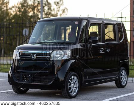Novosibirsk, Russia -   August 03, 2022:  Black  Honda N-box,   Side View.  Hatchback  Car   On A Pa