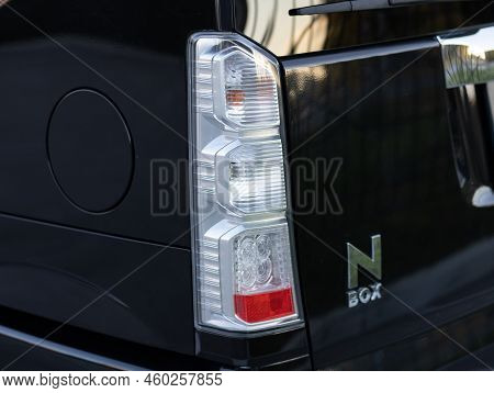 Novosibirsk, Russia -   August 03, 2022:   Honda N-box,  Back Of A  Black Car:  Bumper, Trunk Lid, T