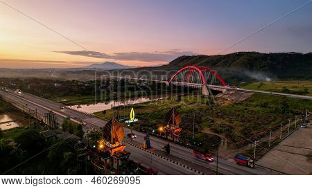Aerial View Of The Kalikuto Bridge, An Iconic Red Bridge At Trans Java Toll Road, Batang When Sunris