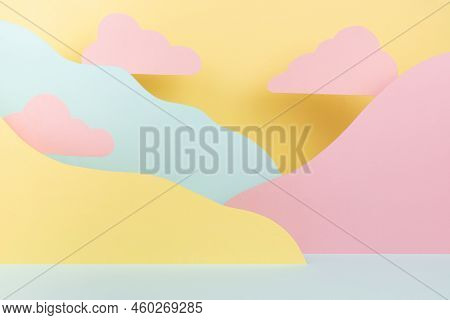 Abstract Scene - Landscape With Pink Clouds, Mountains Of Paper In Pastel Yellow, Mint Color In Funn