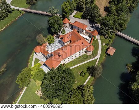 Romantic Otocec Castle On Krka River In Slovenia. Drone View.