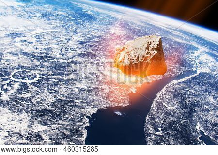 Planet Earth And Big Asteroid In The Space. Potentially Hazardous Asteroids. Asteroid In Outer Space