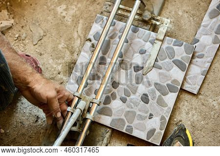 Tile Cutter Is Used By Tiler For Interior Construction Work.