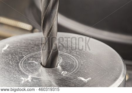 Metal Drill Bit Make Holes In Aluminum Billet On Industrial Drilling Machine With Shavings. Metal Wo