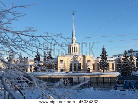 PETROZAVODSK, RUSSIA - JANUARY 18: Commuter trains on the railway station of Petrozavodsk, Karelia, Russia on January 18, 2013. The building was built in 1955 in late neoclassical style