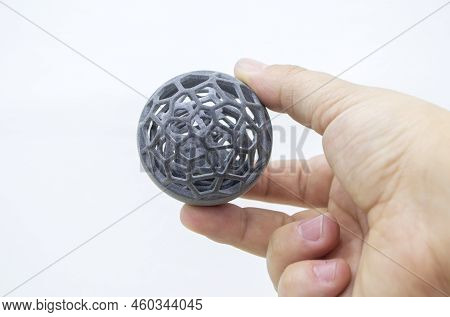 Person Holding Plastic Model Printed On Powder 3d Printer From Biocompatible Polyamide Powder. Multi
