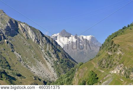 View On A Glacier Of The Mont Blanc Massif Between Mountains Under Clear Blue Sky In Tarentaise