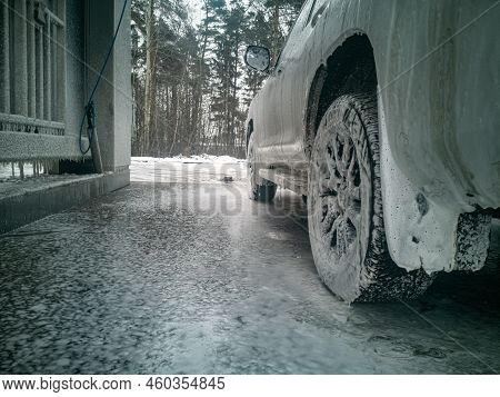 White Offroad Car Stand On Carwash Winter