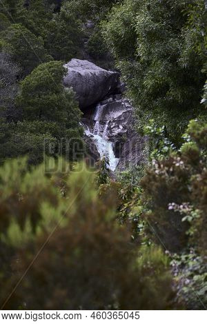 Waterfall And Rocks Of The Fafiao River, In The Gerês Natural Park (portugal)