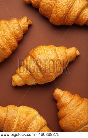 Freshly Baked Croissants On Brown Wooden Background Warm Fresh Buttery Croissants And Rolls. Top Vie