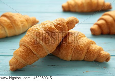 Freshly Baked Croissants On Blue Wooden Background Warm Fresh Buttery Croissants And Rolls. Top View